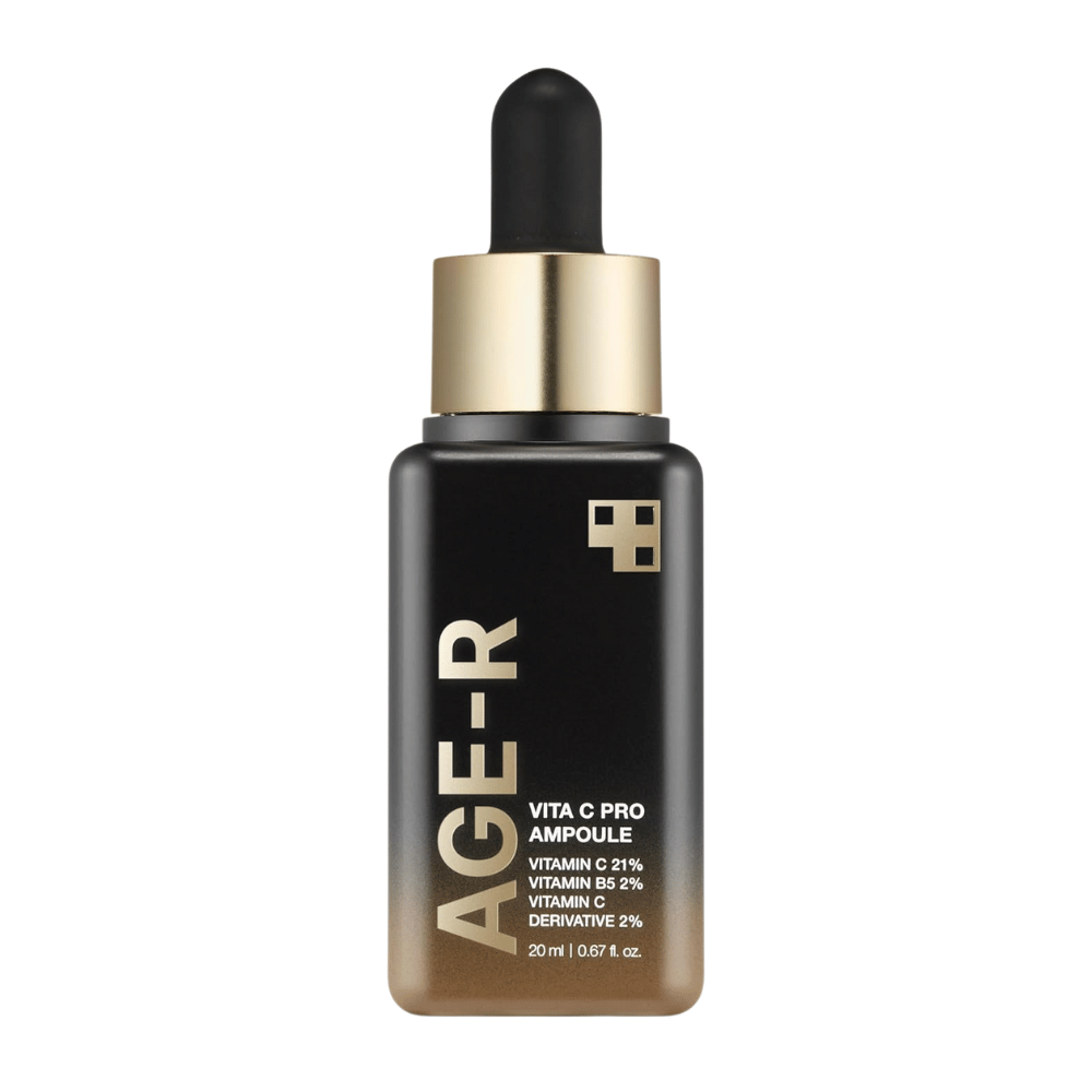 Flaske af Medicube Age-R Vita C Pro Ampoule, et produkt der indeholder 21% vitamin C, 2% vitamin B5 og 2% vitamin C-derivat. Den sorte og gyldne emballage har en pipette til præcis påføring. Produktet er designet til at lysne og forbedre hudens struktur.