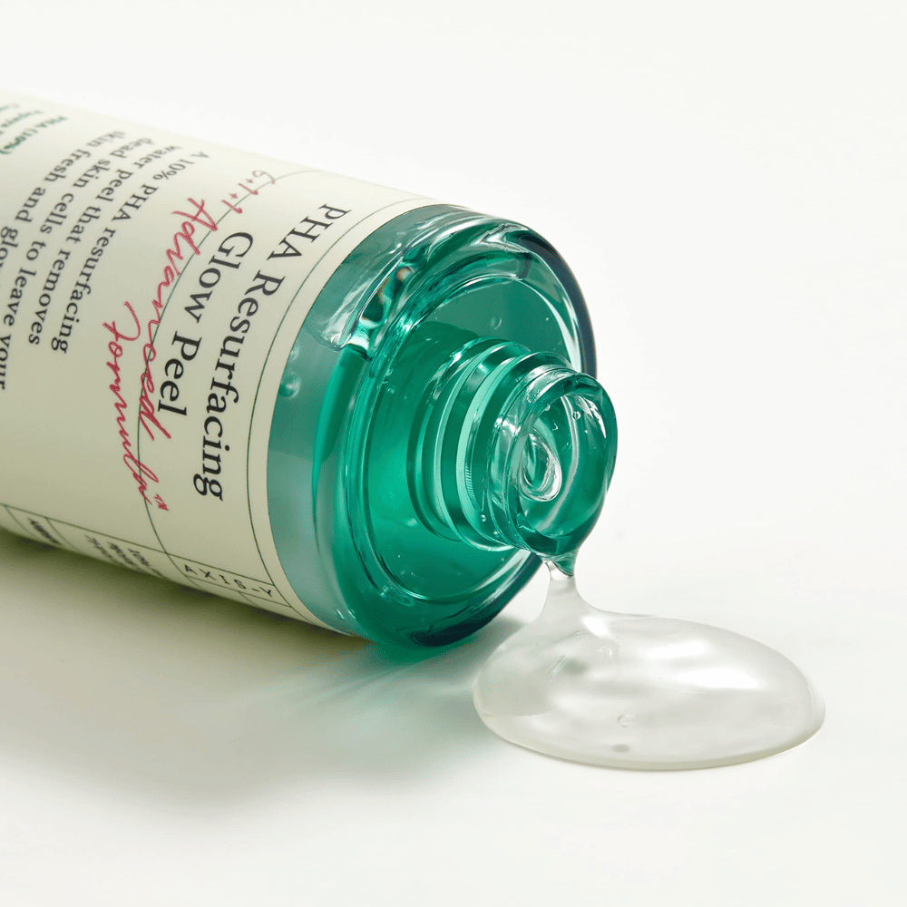 En flaske AXIS - Y PHA Resurfacing Glow Peel 50ml på en glat overflade.