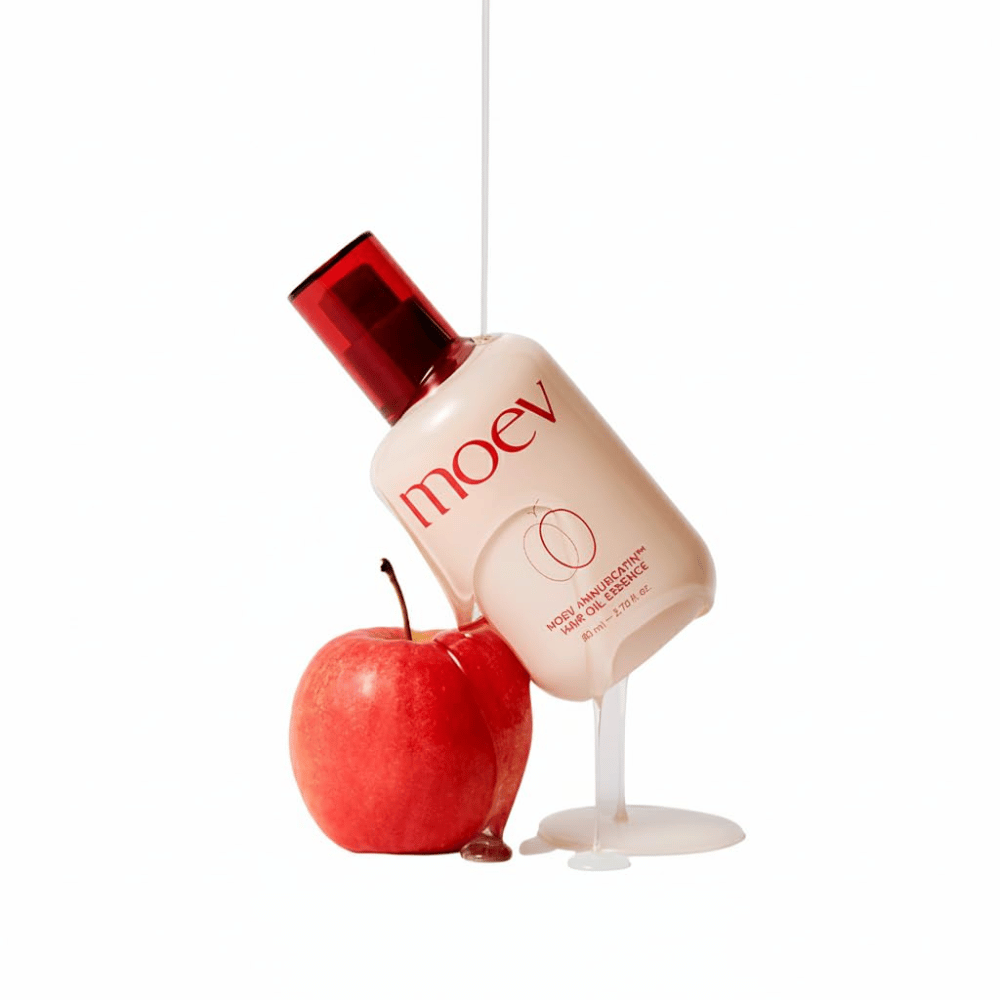 MOEV Annurcatin Hair Oil Essence med rødt æble – hårolie inspireret af Annurca-æblets antioxidanter for stærkere, mere glansfulde og sundere hårstrå.