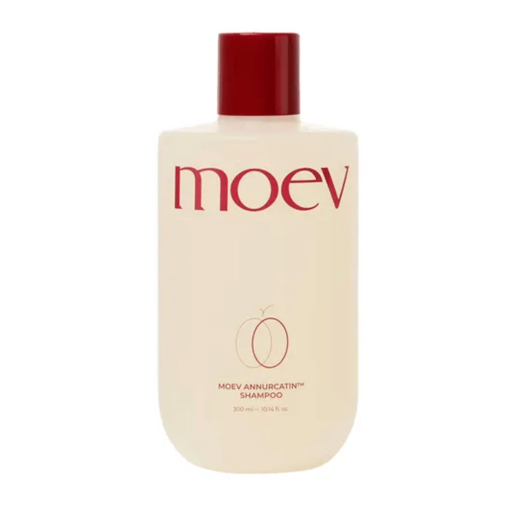 MOEV Annurcatin Shampoo 300 ml – en næringsrig, vegansk shampoo beriget med Annurca-æble, biotin og koffein, der styrker håret og fremmer en sund hovedbund.