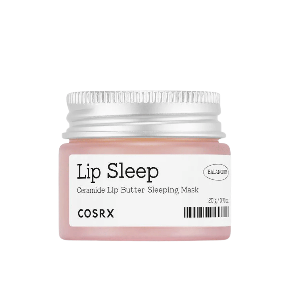 COSRX Lip Sleep Ceramide Lip Butter Sleeping Mask i rosa krukke med sølvlåg. En duftfri, nærende natmaske til bløde, fugtede læber.