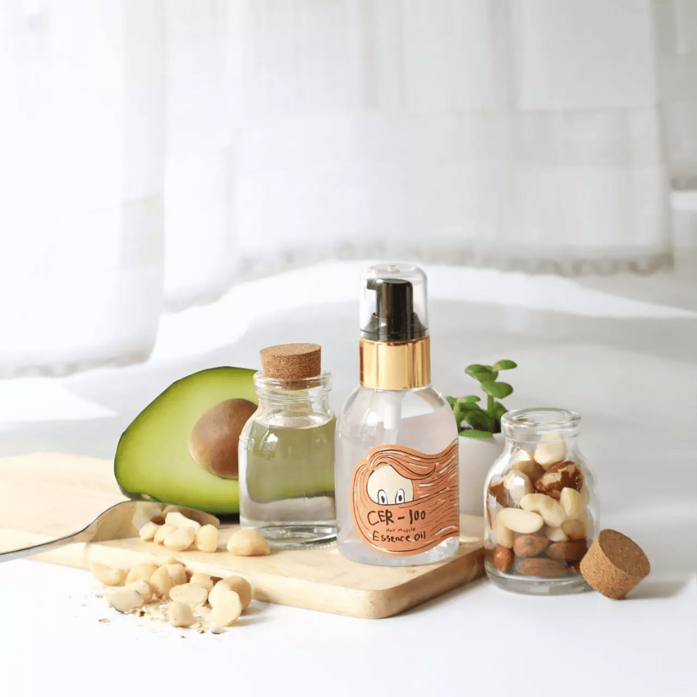 Elizavecca CER-100 Hair Muscle Essence Oil – koreansk hårolie med avocado og naturlige olier, der hjælper med at fugte, styrke og give glans til tørt og skadet hår.