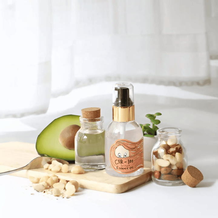 Elizavecca CER-100 Hair Muscle Essence Oil – koreansk hårolie med avocado og naturlige olier, der hjælper med at fugte, styrke og give glans til tørt og skadet hår.