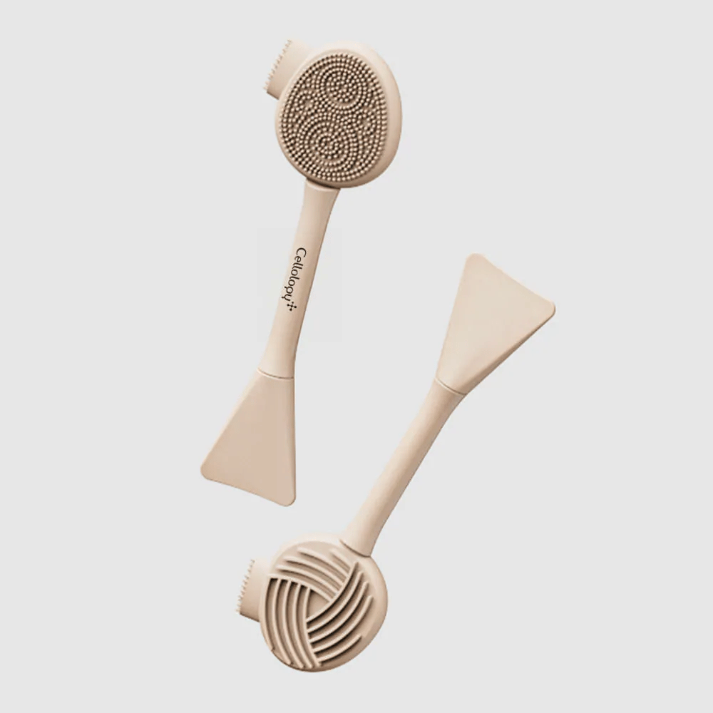 2. Cellolopy Cleaning Brush – for- og bagside af multifunktionel rensebørste med silikonebørster, riflet overflade og spartel