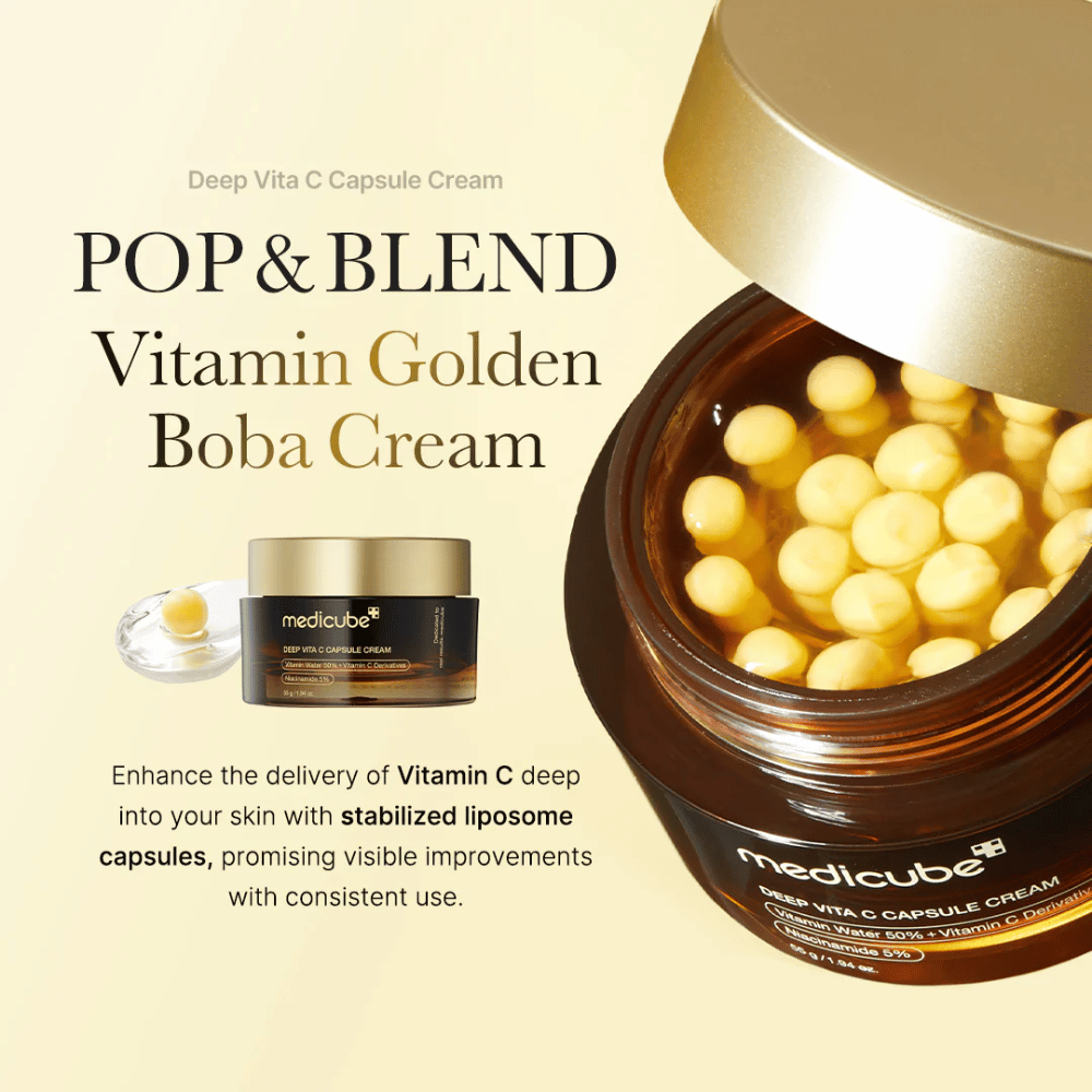 Emballagen af "Medicube Deep Vita C Capsule Cream," en vitamin C-beriget creme, der indeholder stabiliserede liposomkapsler for effektivt at trænge ind i huden. Teksten "POP & BLEND Vitamin Golden Boba Cream" fremhæver produktets egenskaber, og den visuelle præsentation viser kapslerne, som lover synlige forbedringer med kontinuerlig brug.