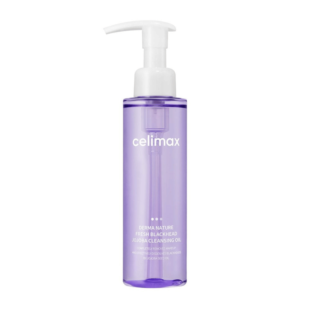 Flaske af Celimax Derma Nature Fresh Blackhead Jojoba Cleansing Oil i gennemsigtig lilla emballage med hvid pumpe, mod hvid baggrund.