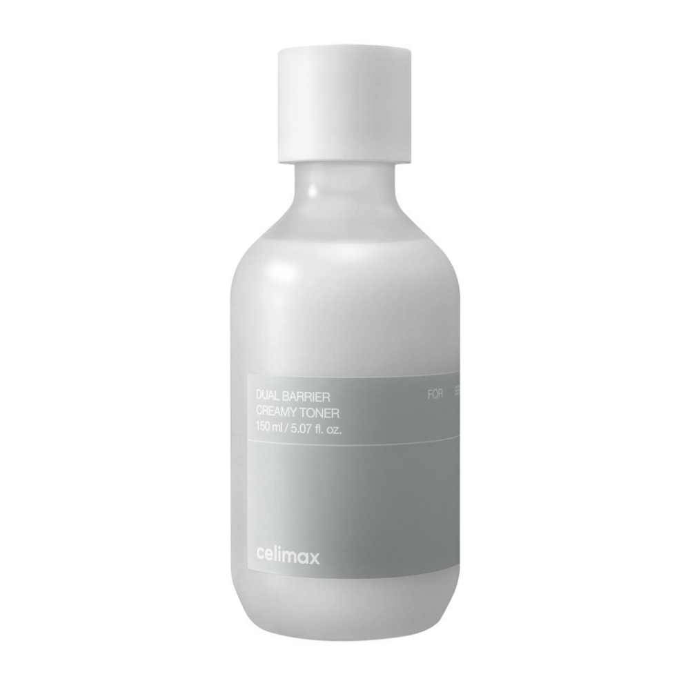 Hvid flaske med grå etiket til Celimax Dual Barrier Creamy Toner – en fugtgivende toner med mild formel, specielt designet til sensitiv og tør hud.