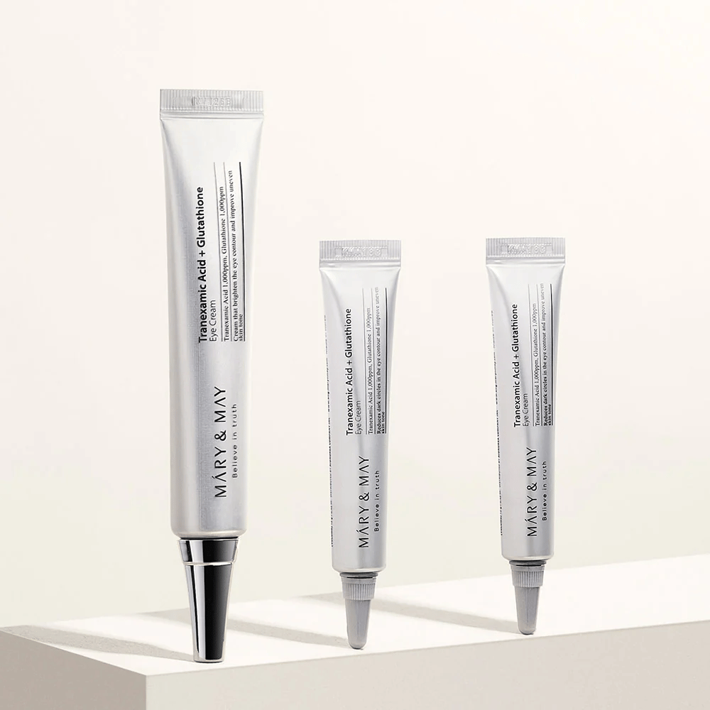 Øjencreme fra Mary&May med tranexamsyre og glutathione i flere størrelser, udviklet til at reducere pigmentering og give klarere hud omkring øjnene.
