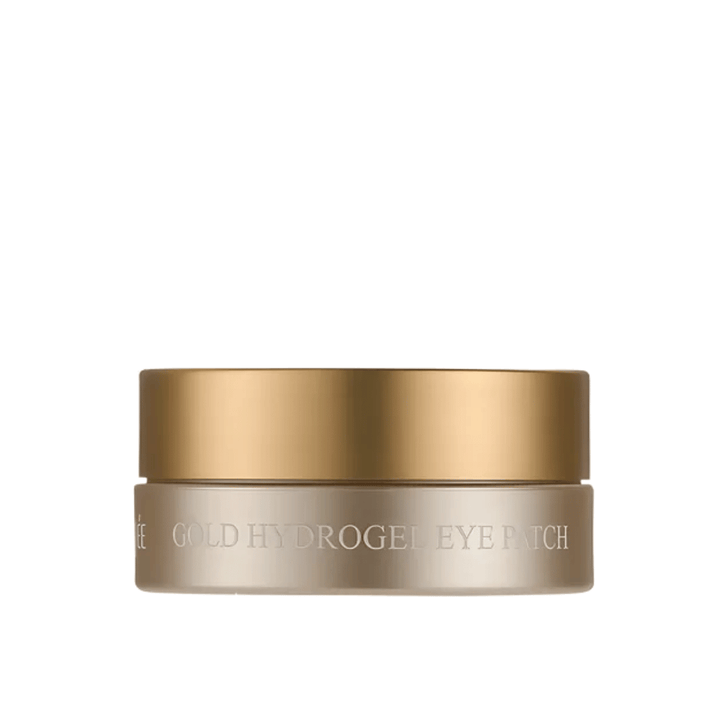 Frilagt produktbillede af PETITFEE Gold Hydrogel Eye Patch i elegant guldfarvet krukke mod lys baggrund. Designet giver et eksklusivt og luksuriøst indtryk.