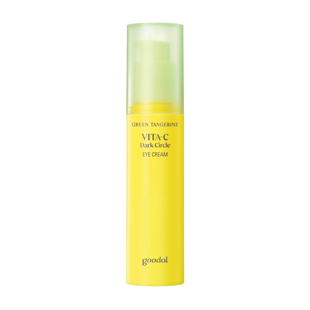 En flaske Goodal Green Tangerine Vita C Dark Circle Eye Cream 30ml på hvid baggrund med C-vitamin.