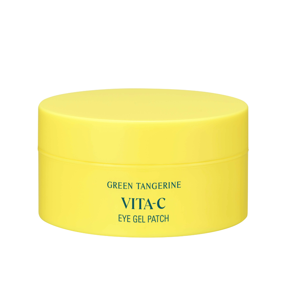 En gul krukke mærket "GREEN TANGERINE VITA-C EYE GEL PATCH" sandsynligvis øjenmasker, der indeholder vitamin C.