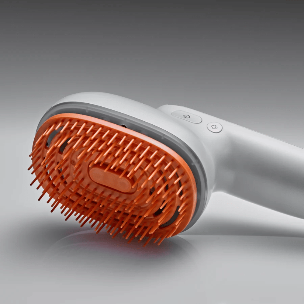 LILYEVE GrowTurn Brush Steam Booster – nærbillede af børstehoved og kontrolknapper