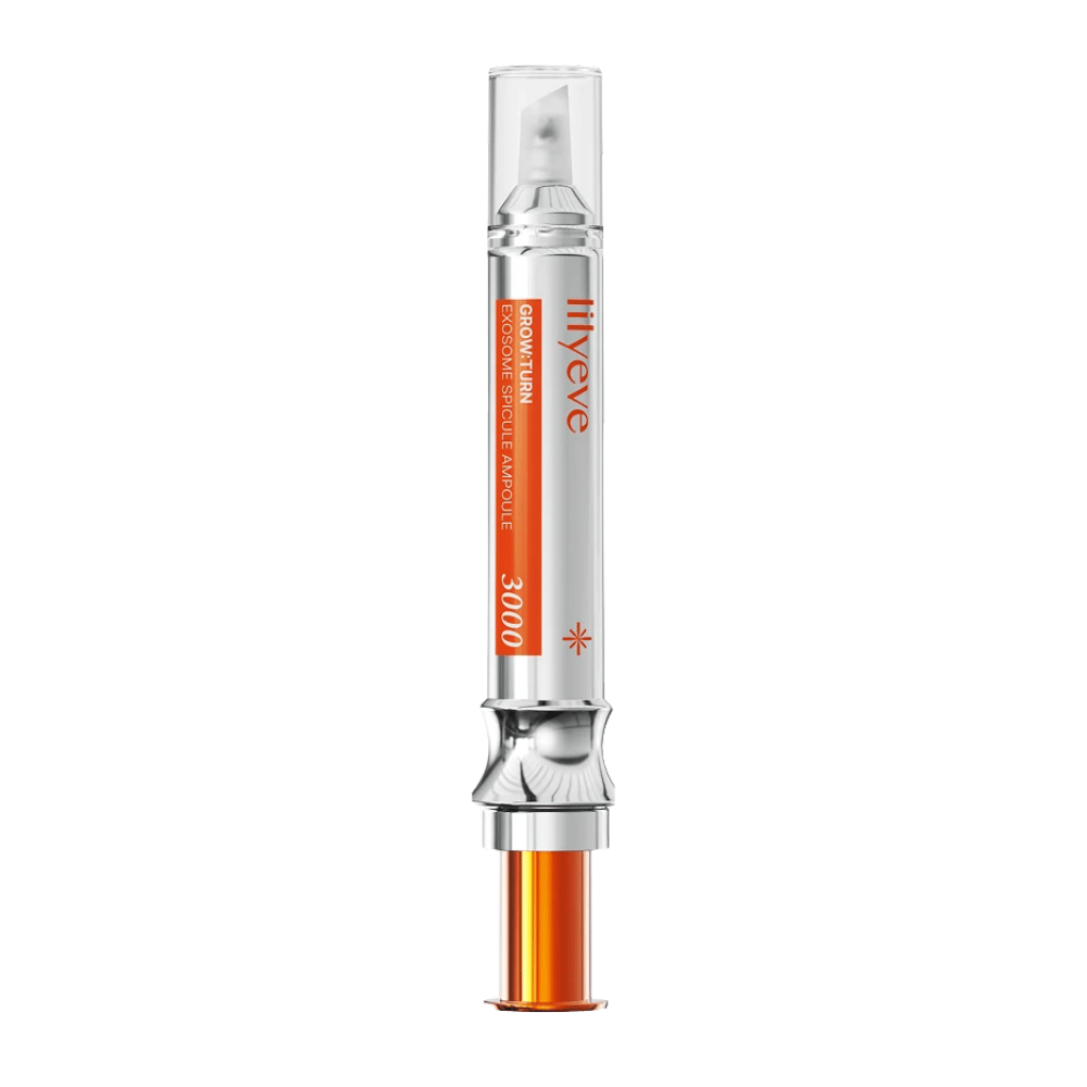 LILYEVE Grow Turn Exosome Spicule Ampoule 3000 – hovedbundsampul med præcisionsapplikator i sølv- og orangefarvet emballage.