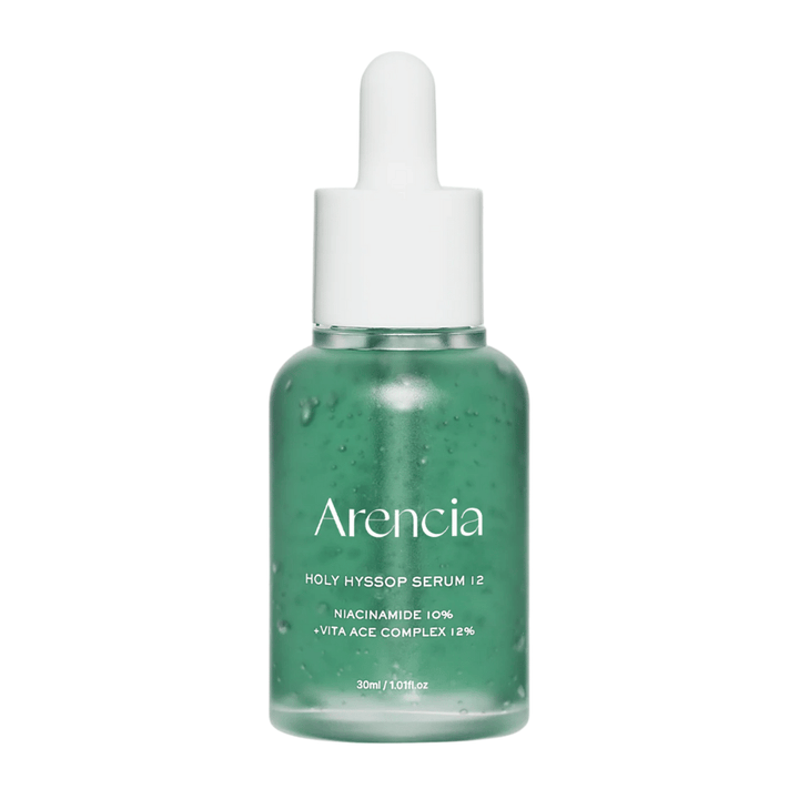 Arencia Holy Hyssop Serum 12 i grøn glasflaske med pipette, ansigtsserum med niacinamid 10 % og vitamin ACE-kompleks 12 %.