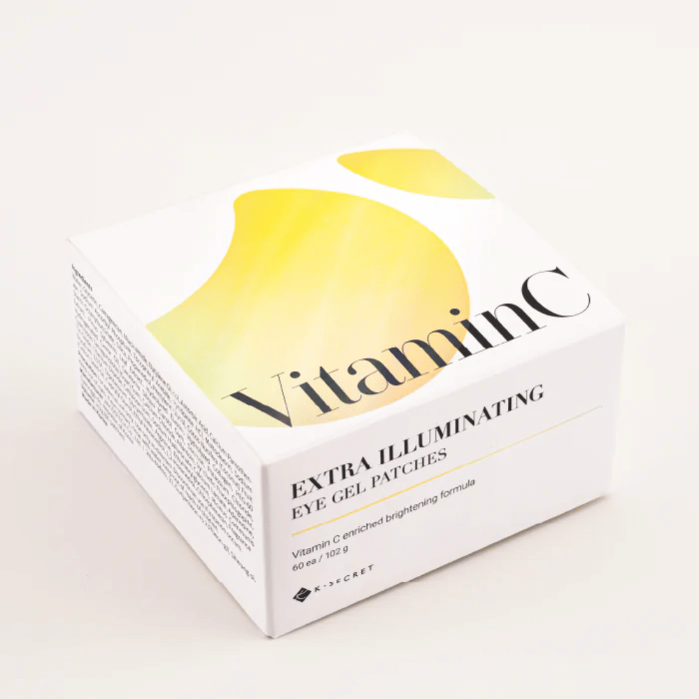 Pakke af K-Secret Extra Illuminating Eye Gel Patches med vitamin C i hvidt og gult design.