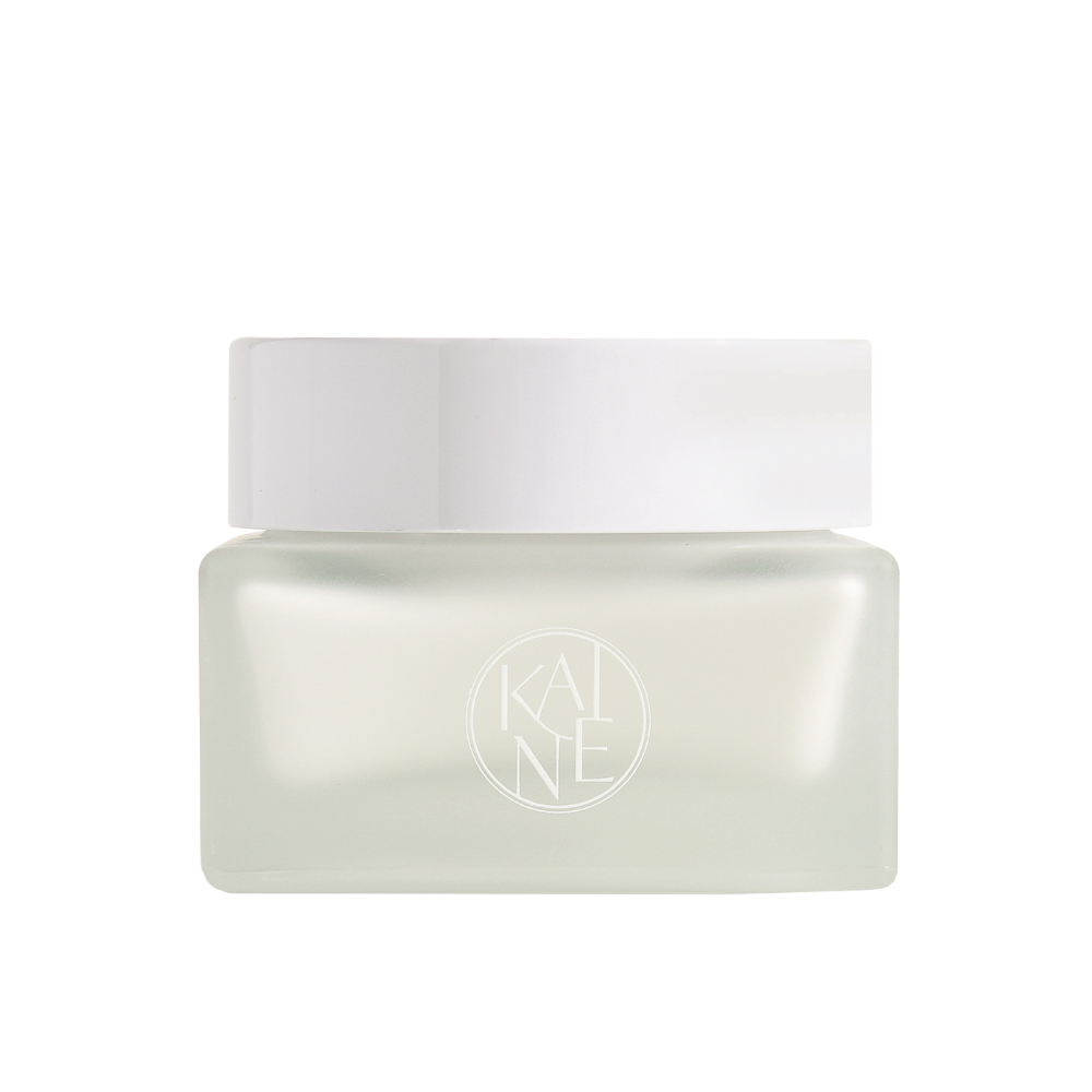 En hvid krukke med KAINE Vegan Collagen Youth Cream 50 ml med et hvidt låg, der fremmer anti-aging og fugtighed.