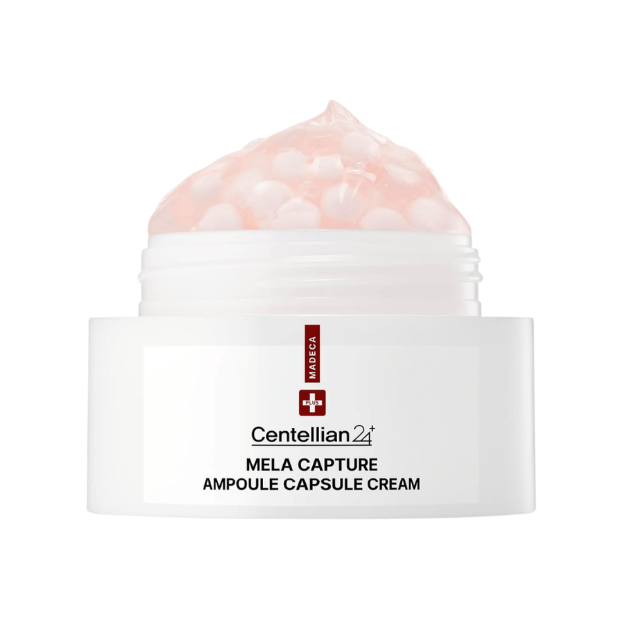 Nærbillede af Centellian24 Madeca Mela Capture Ampoule Capsule Cream, som viser den rosa gelcreme med indkapslede ampulkugler i krukken.