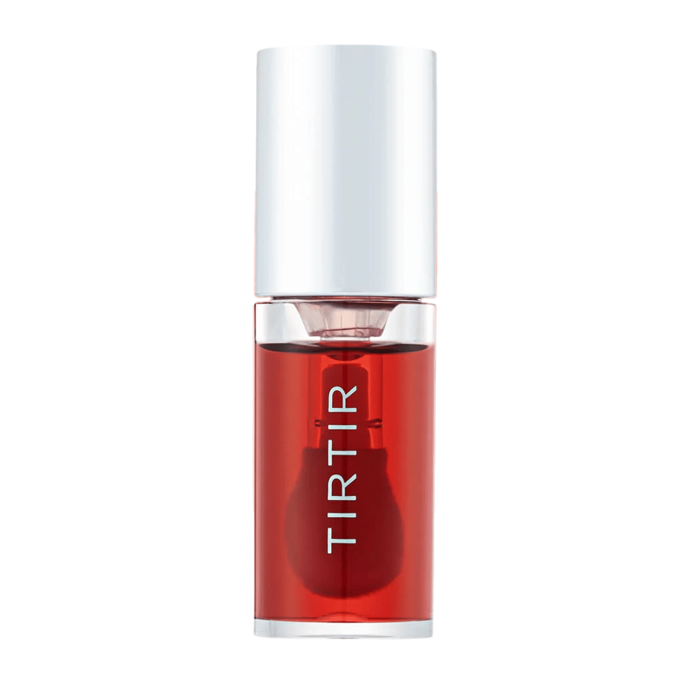 TIRTIR My Glow Lip Oil i gennemsigtig rød nuance med sølvlåg, vist direkte forfra mod hvid baggrund.