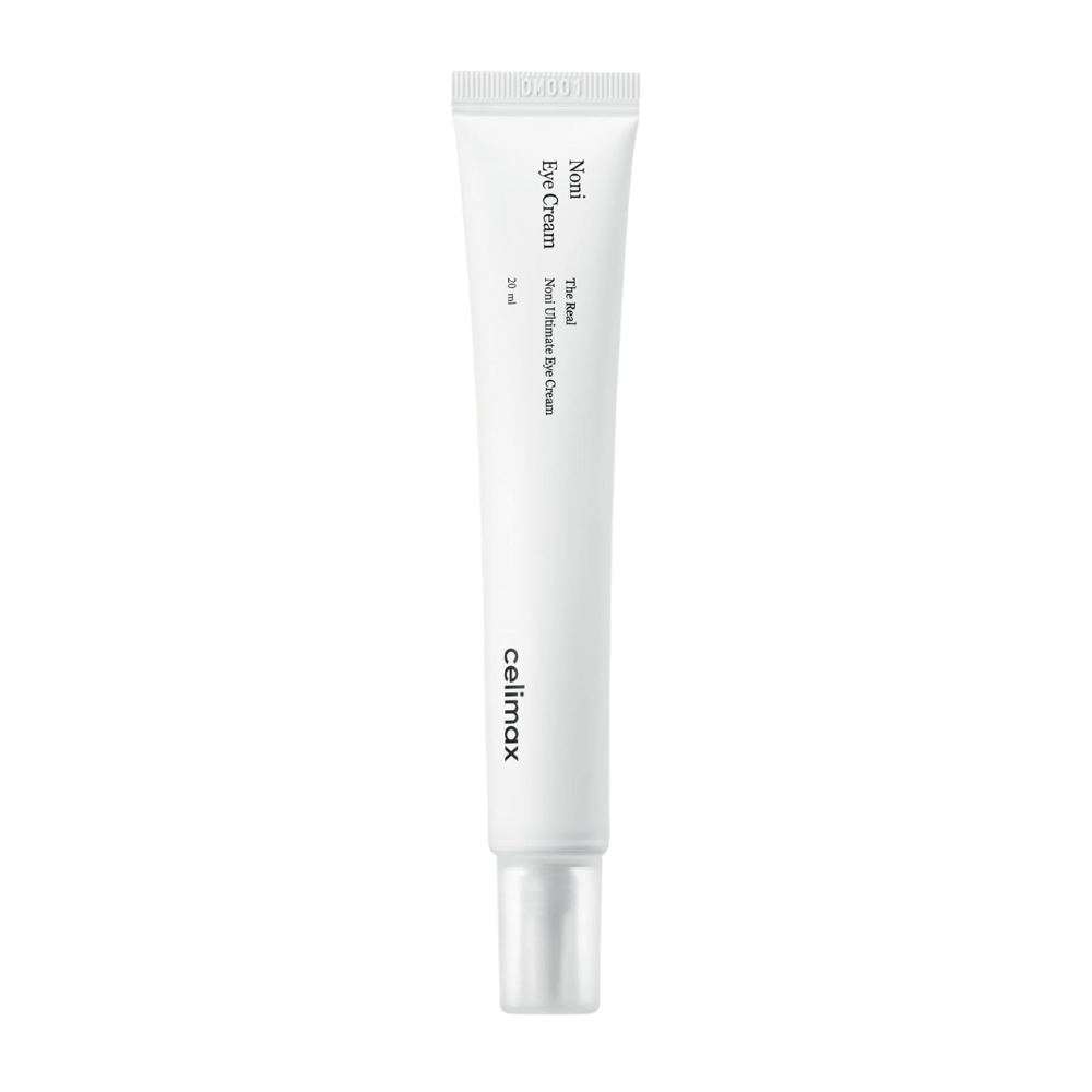 Noni Eye Cream i en hvid tube med en gennemsigtig hætte. Produktet er fra mærket Celimax og indeholder 20 ml. Teksten på tuben angiver, at det er en nærende øjencreme.