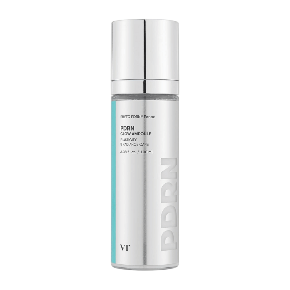 VT PDRN Glow Ampoule i en sølvfarvet flaske med pumpe, mærkning der indikerer indhold på 100 ml. Produktet er designet til elasticitet og strålende hud, med teksten "PHYTO PDRN® Panax" og "Elasticity & Radiance Care".