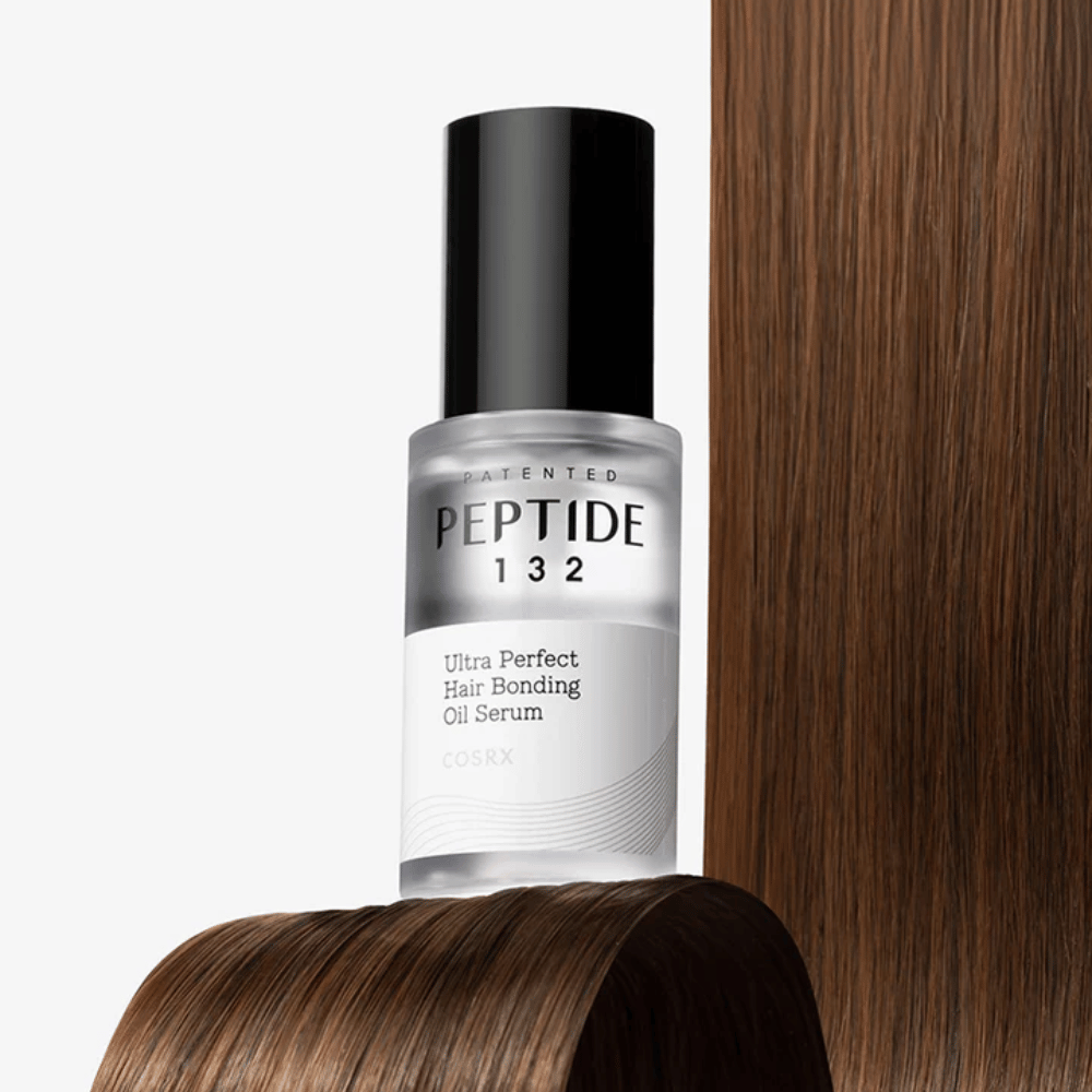 COSRX Peptide 132 Ultra Perfect Hair Bonding Oil Serum placeret mod skinnende hår – giver styrke, blødhed og glans.
