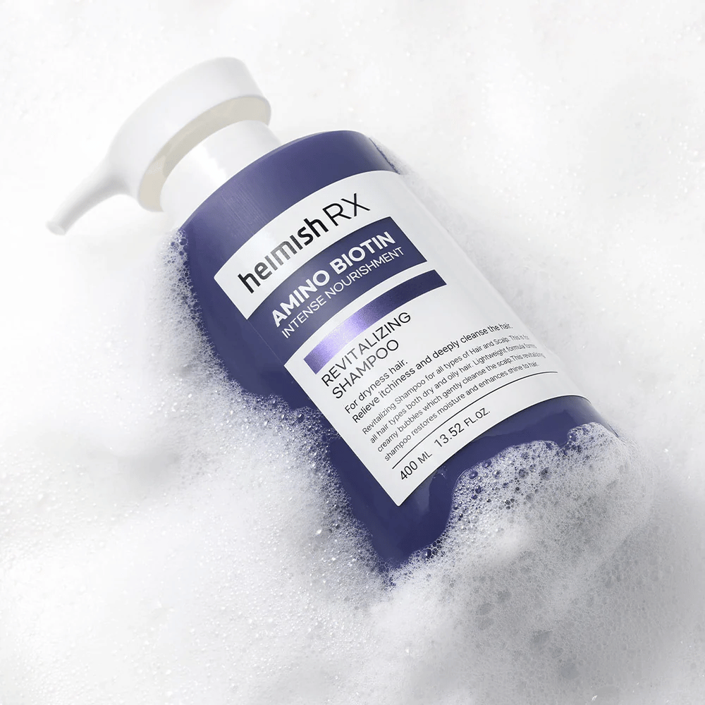 Heimish RX Amino Biotin Revitalizing Shampoo 400 ml i skum – nærende shampoo til tørt hår, der renser skånsomt og fugter hovedbunden.