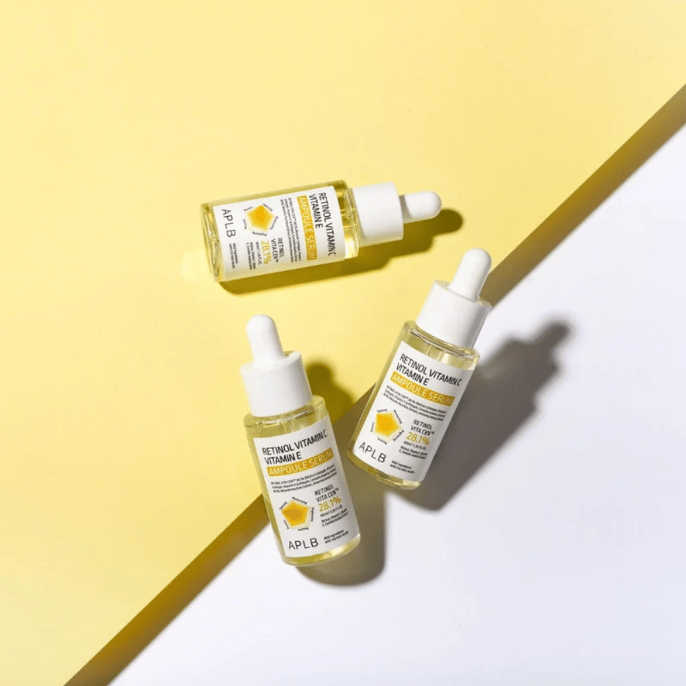 APLB Retinol Vitamin C Vitamin E Ampoule Serum på gul og hvid baggrund