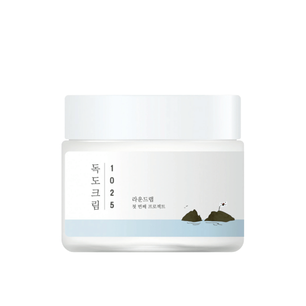 En krukke med Round Lab 1025 Dokdo Cream 80ml til fugtgivning på hvid baggrund.
