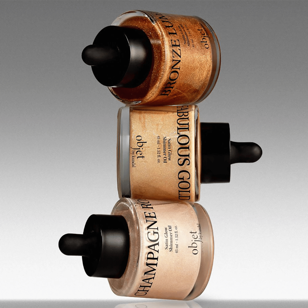 Objet by KUNDAL Satin Glow Shimmer Oil i Bronze Lumière, Fabulous Gold og Champagne Rose – skinnende kropsolier med glødgivende finish.