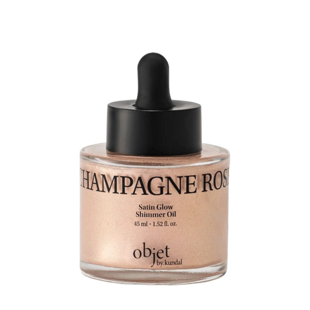Objet by KUNDAL Satin Glow Shimmer Oil Champagne Rose 45 ml – glødgivende kropsolie med fin rosaguldskimrende finish.