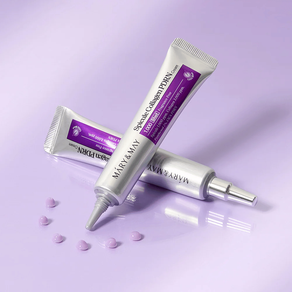Mary & May Spicule Collagen PDRN Cream i flere tuber på lilla baggrund, intensivt genopbyggende ansigtscreme med spicule-teknologi og kollagen.
