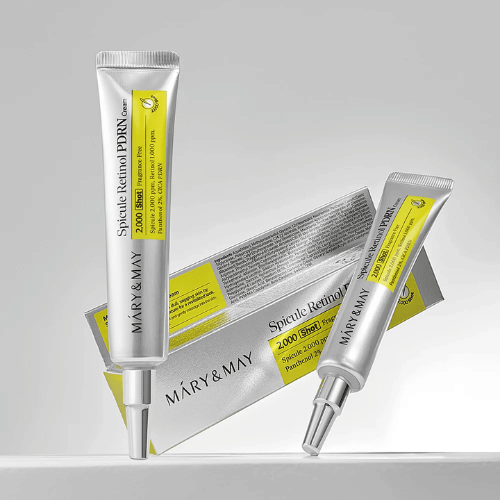 MARY & MAY Spicule Retinol PDRN Cream i tube sammen med originalemballage, en koreansk ansigtscreme med retinol og PDRN der understøtter hudens regenerering.