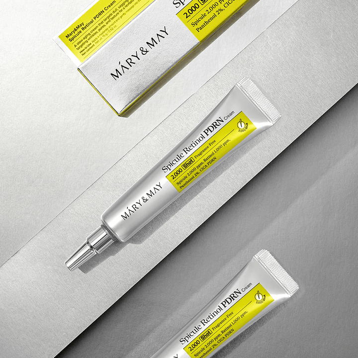 MARY & MAY Spicule Retinol PDRN Cream i tube og emballage på lys baggrund, en aktiv ansigtscreme med retinol, spicule-teknologi og PDRN til forbedret hudstruktur og hudfornyelse.