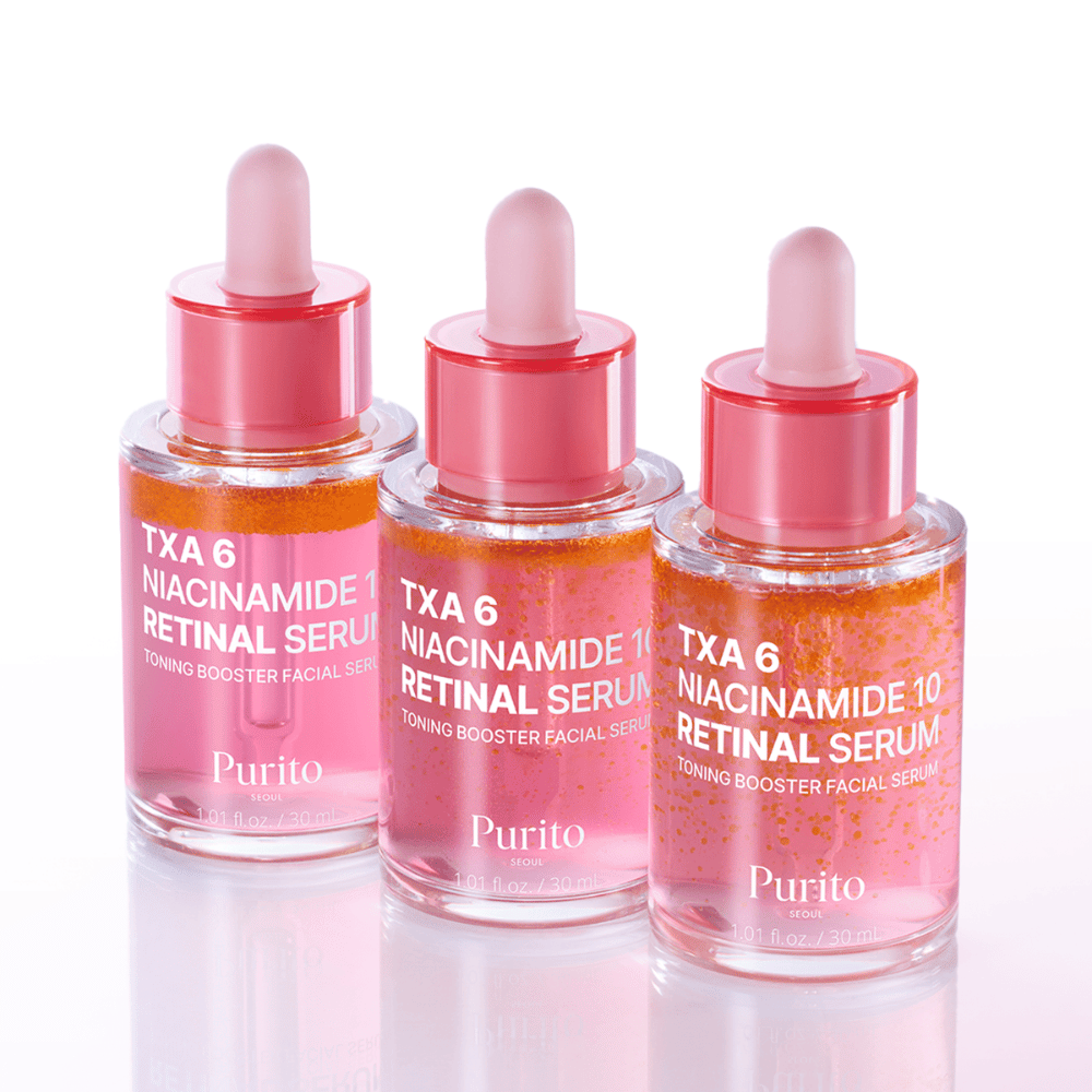 Tre flaskor av Purito TXA 6 Niacinamide 10 Retinal Serum. Ett lystergivande och jämnande ansiktsserum med anti-aging-effekt.