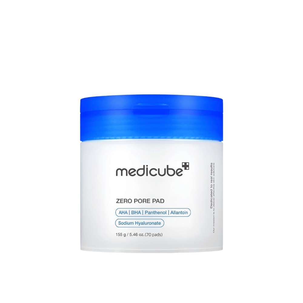 Medicube Zero Pore Pad 2.0, 70 eksfolierende toner-pads med AHA, BHA og panthenol i en hvid krukke med blåt låg mod hvid baggrund.