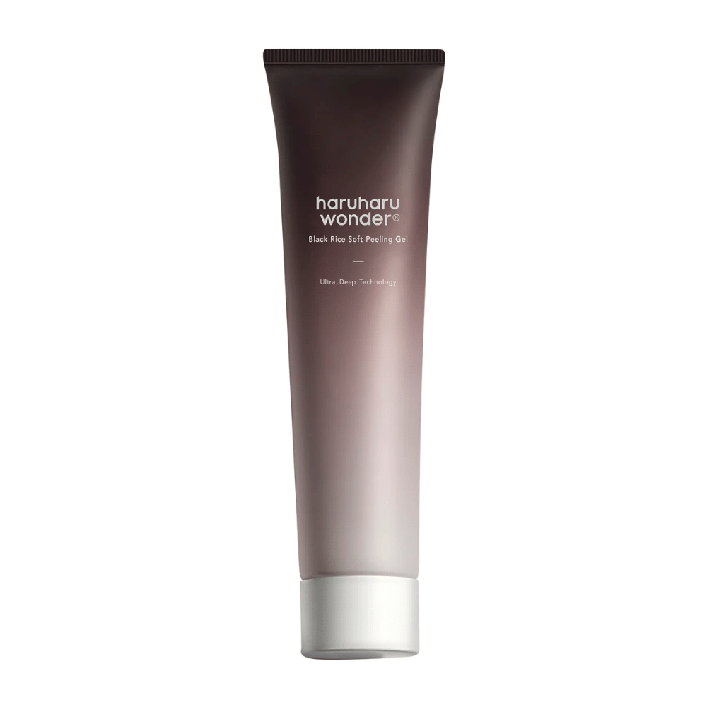 Et rør Haruharu Wonder Black Rice Soft Peeling Gel 100ml med eksfolierende egenskaber på en hvid baggrund.